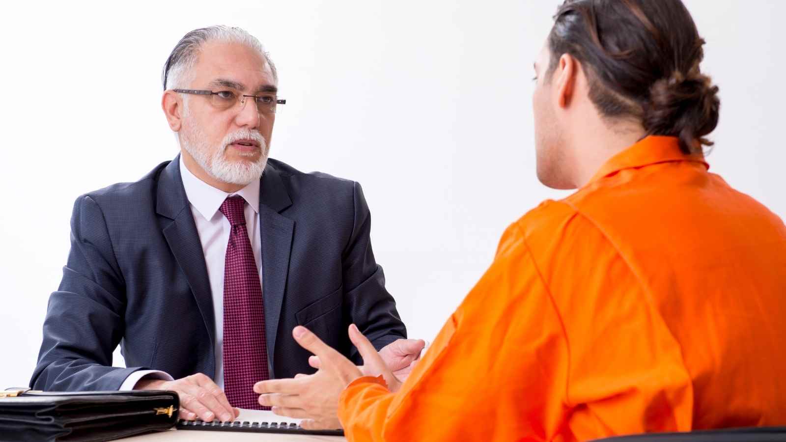 Psychologist talking with inmate