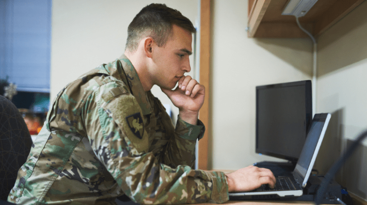 military student working on laptop in college (1)