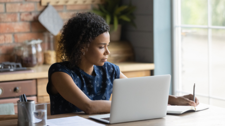 woman taking exam at home